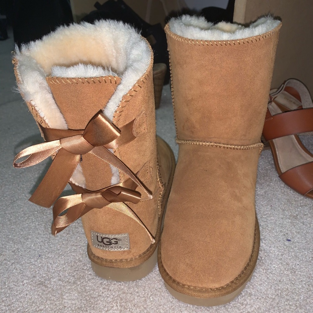 Brown UGG boots w/ back ties
